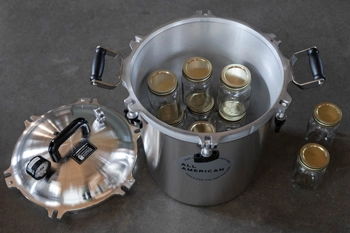 Inside view of All American 930 canner with pint jars loaded.